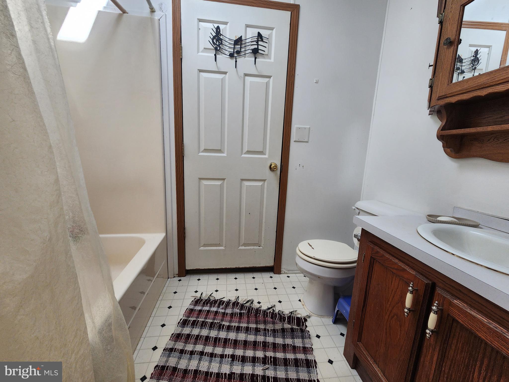 1337 Tower Road Camden Wyoming, DE 19934 - Photo 32 of 41 a bathroom with a sink a toilet and shower