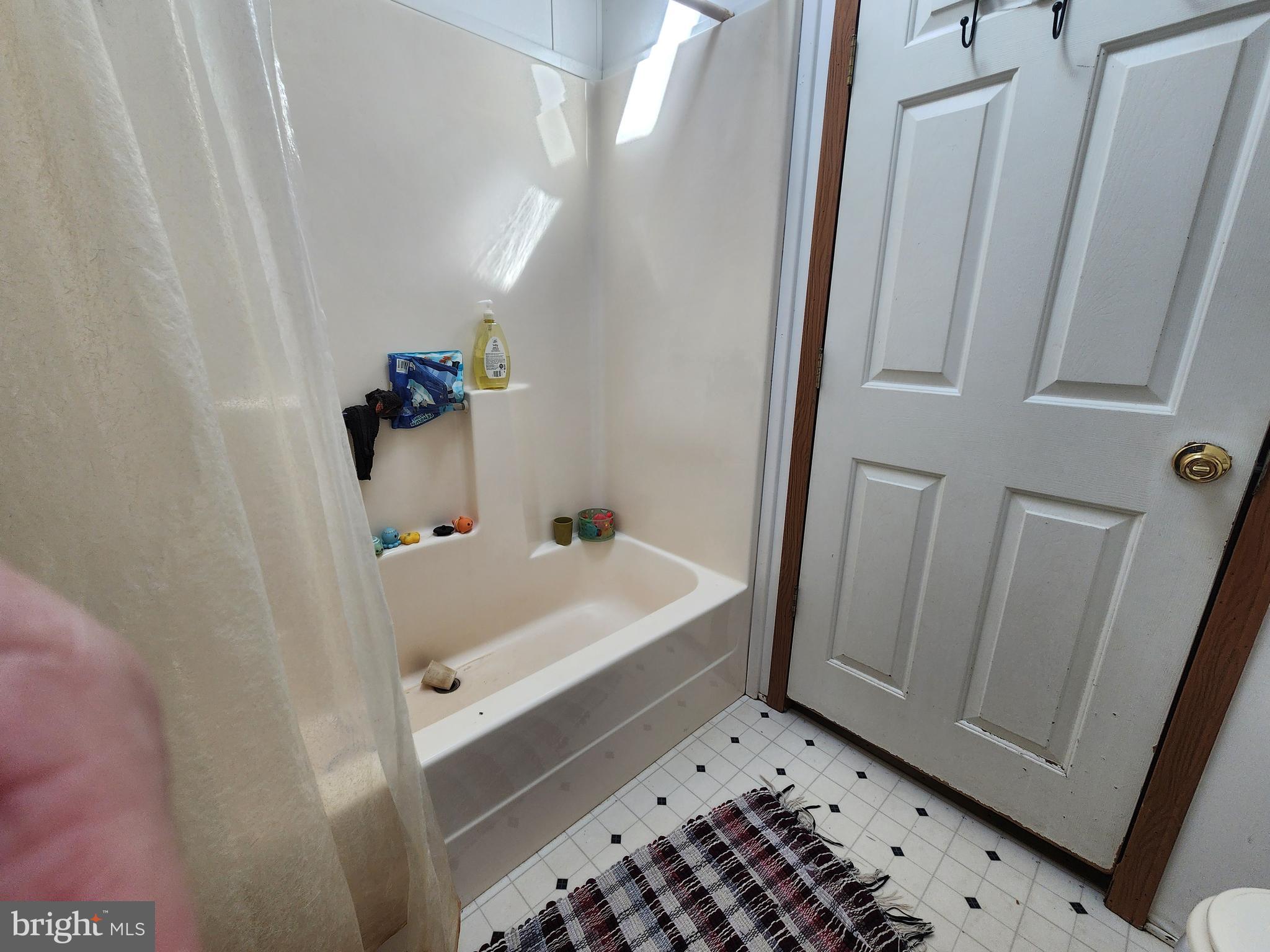 1337 Tower Road Camden Wyoming, DE 19934 - Photo 34 of 41 a bathroom with a sink and a mirror