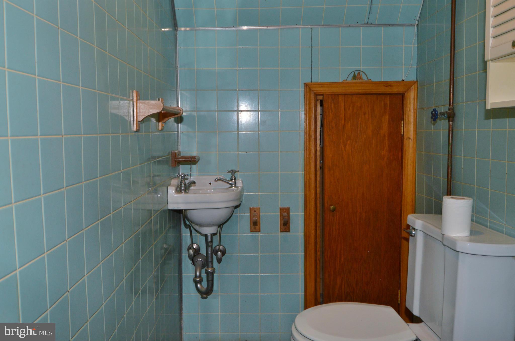 2240 Crest Road Baltimore, MD 21209 - Photo 18 of 25 Lower level powder room