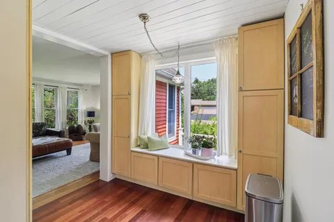 a kitchen with stainless steel appliances a sink a stove and a refrigerator