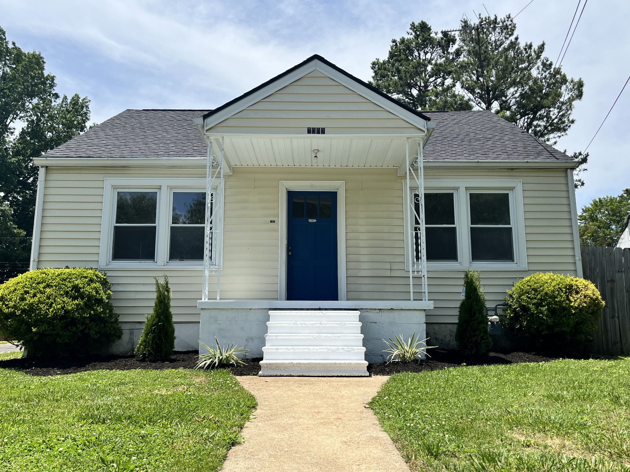 2002 Denham Avenue Columbia, TN 38401 - Photo 1 of 10 a front view of a house with garden