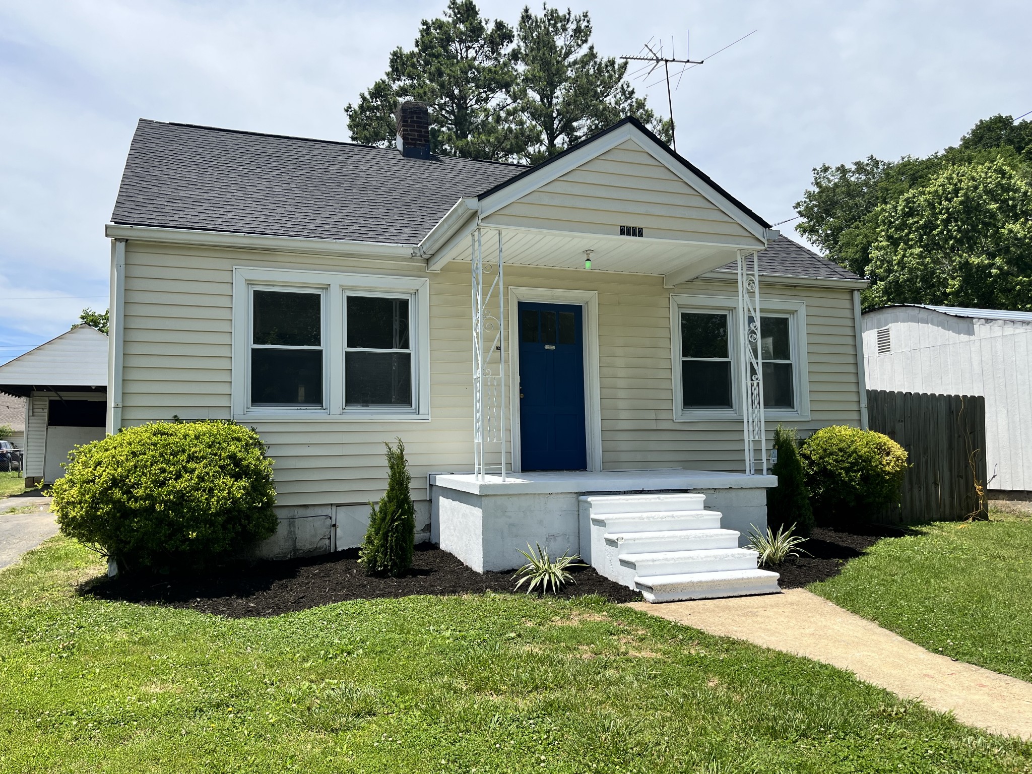 2002 Denham Avenue Columbia, TN 38401 - Photo 2 of 10 a view of a house with a yard and plants