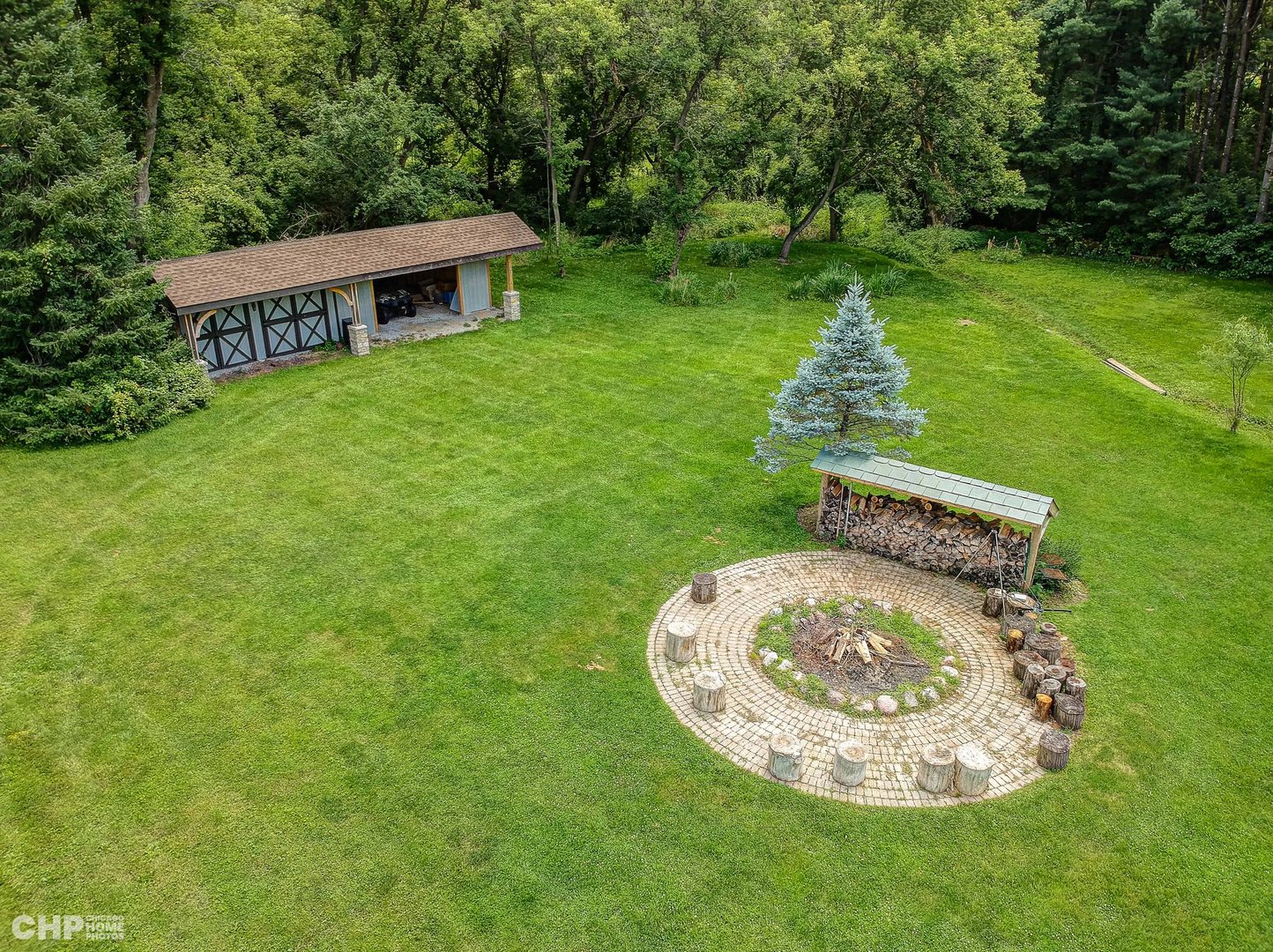 4 Middlebury Road Barrington, IL 60010 - Photo 43 of 49 a view of a house with a backyard
