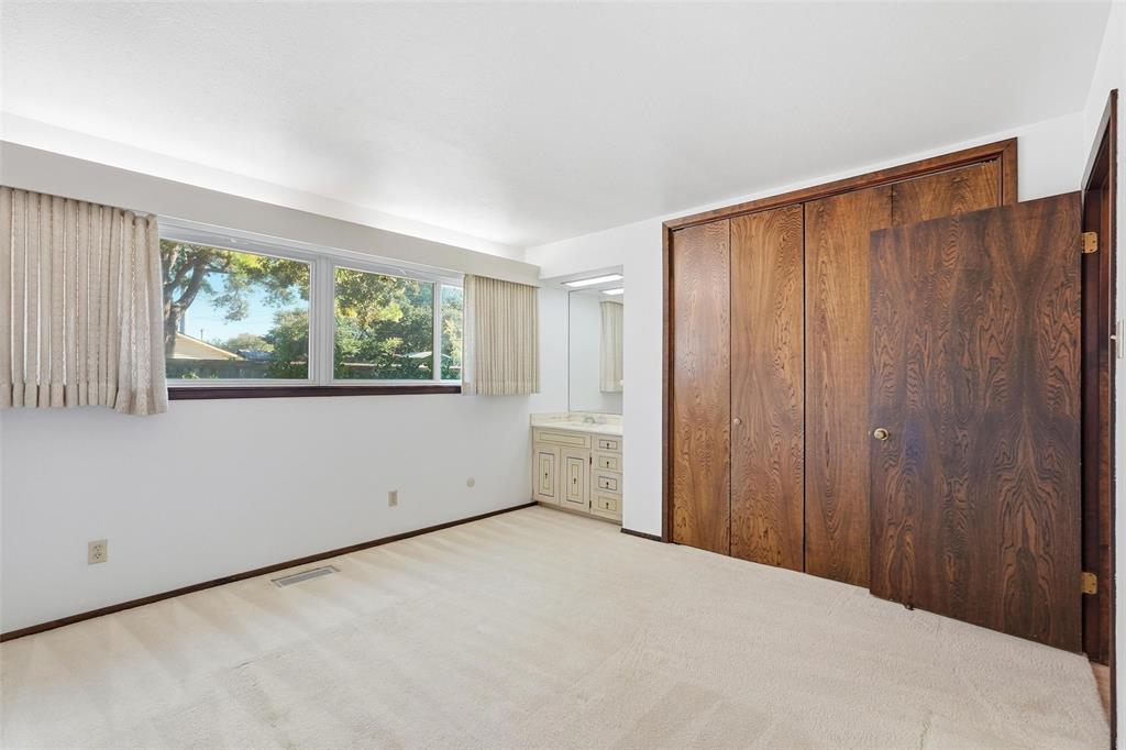 112 Virginia Lane Arlington, TX 76010 - Photo 27 of 39 an empty room with windows