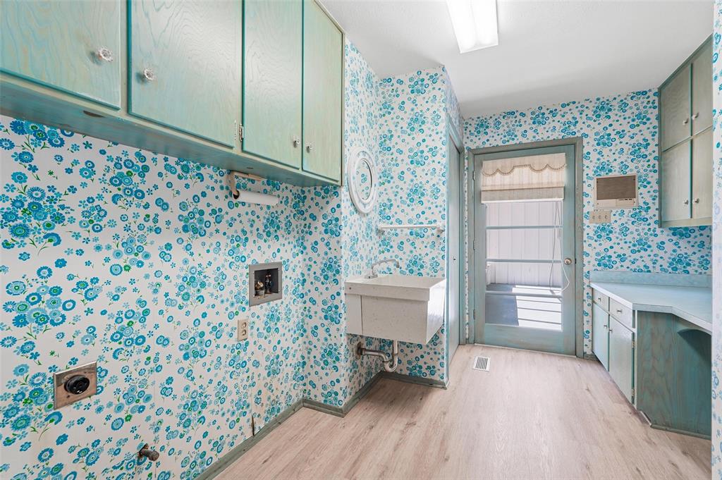 112 Virginia Lane Arlington, TX 76010 - Photo 31 of 39 a room with furniture and a fireplace