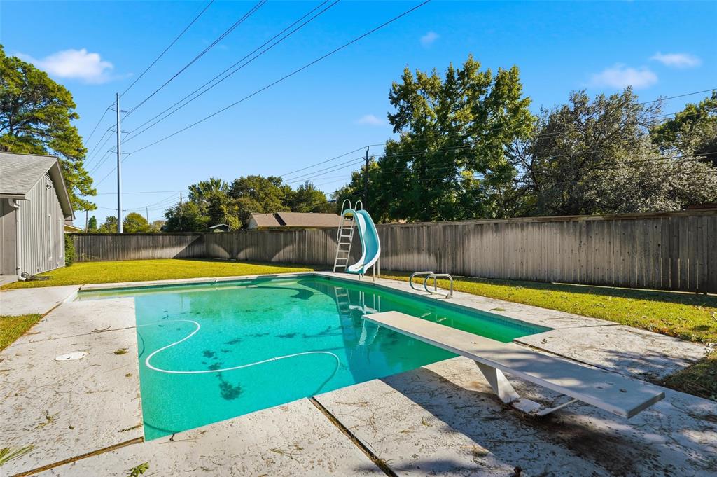 112 Virginia Lane Arlington, TX 76010 - Photo 34 of 39 a view of a swimming pool with a yard and sitting area