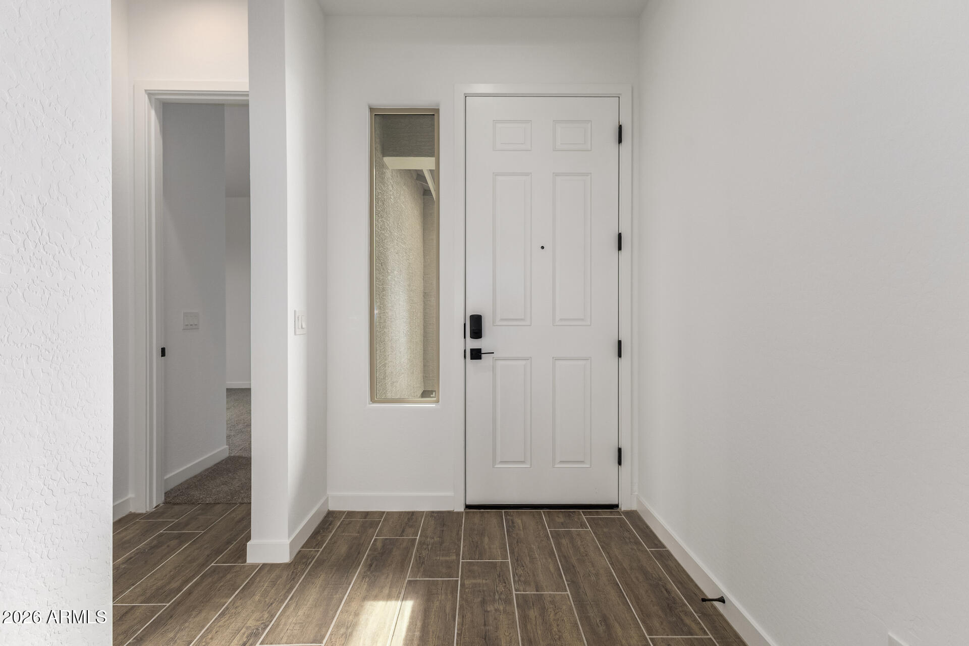 18146 West Watkins Street Goodyear, AZ 85338 - Photo 11 of 36 wooden floor in a gallery