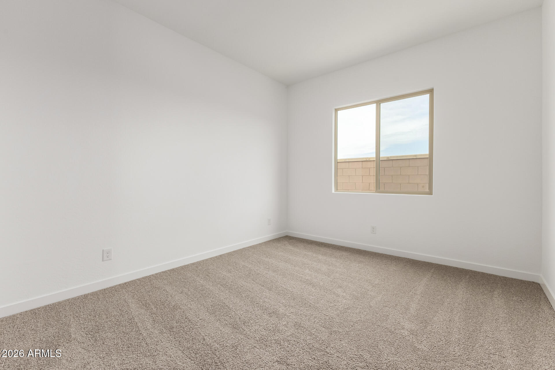 18146 West Watkins Street Goodyear, AZ 85338 - Photo 24 of 36 an empty room with a window