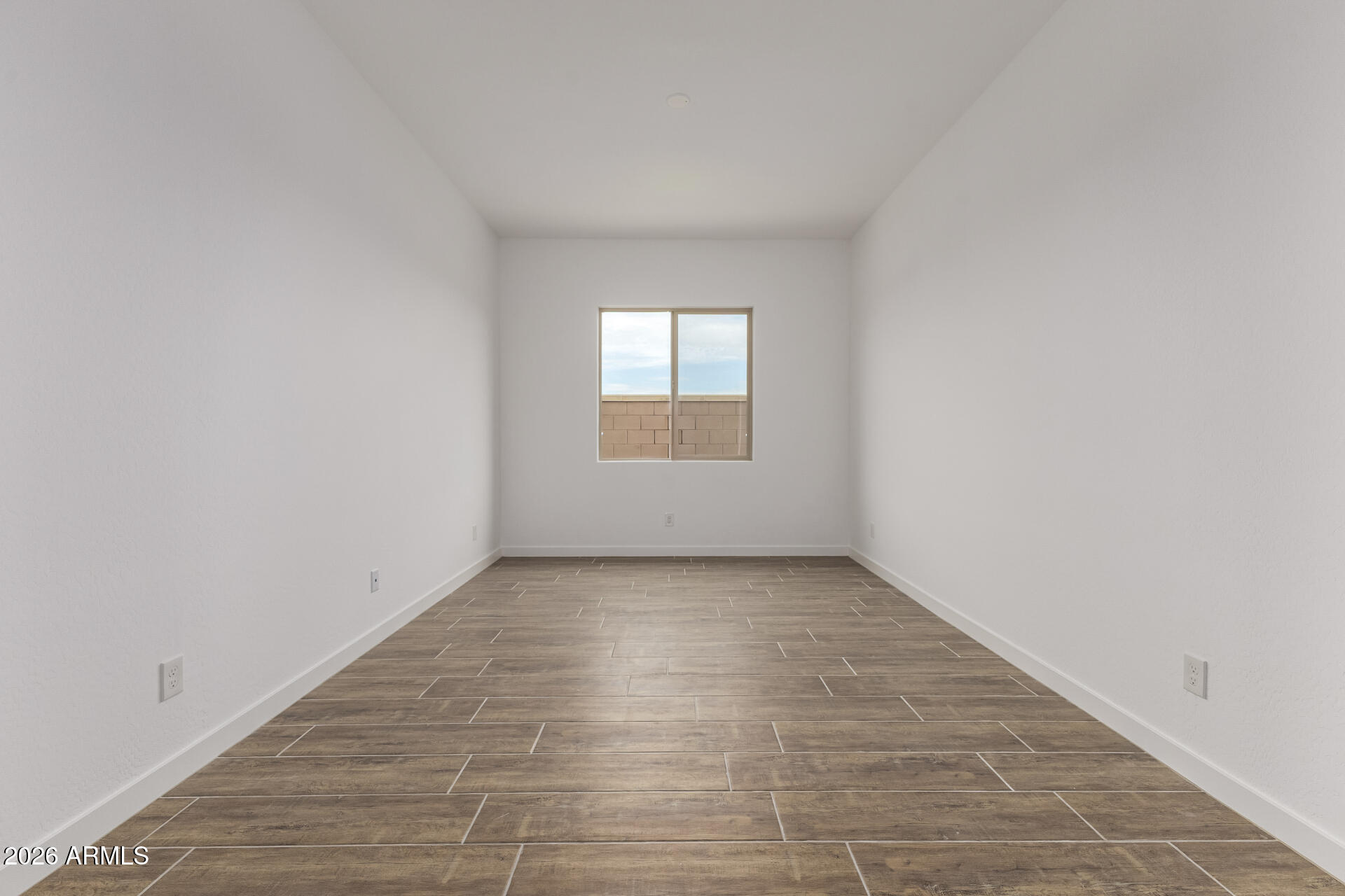 18146 West Watkins Street Goodyear, AZ 85338 - Photo 25 of 36 an empty room with windows