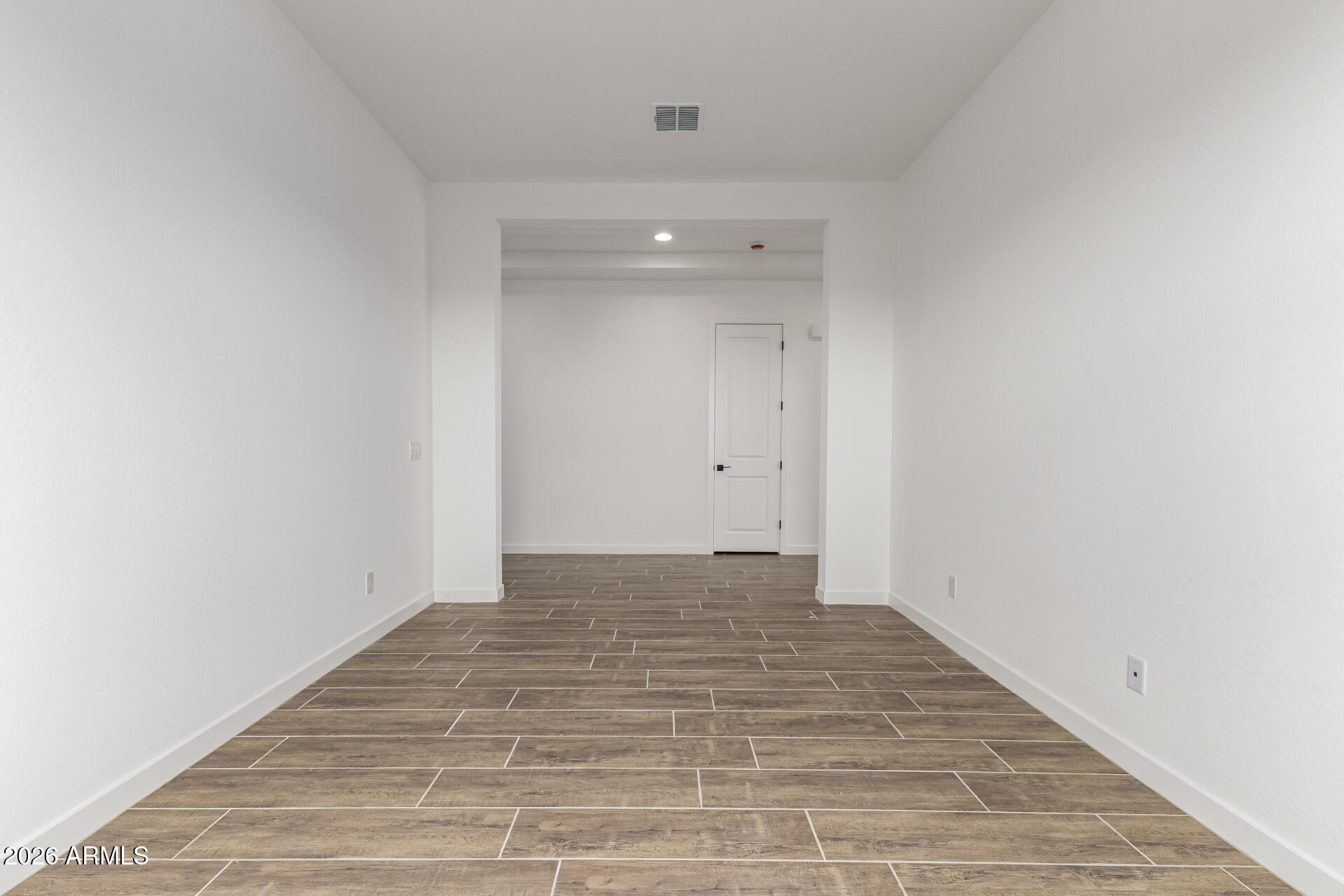 18146 West Watkins Street Goodyear, AZ 85338 - Photo 26 of 36 a view of an empty room