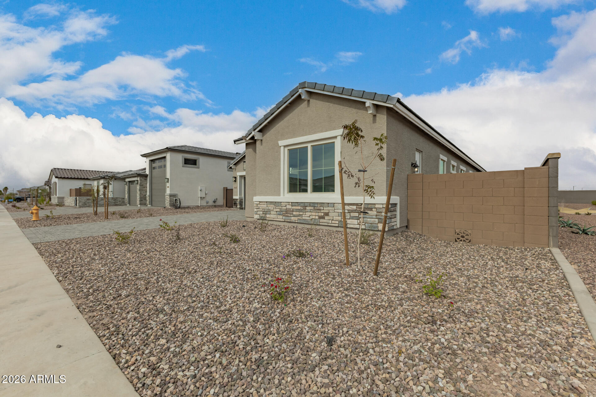 18146 West Watkins Street Goodyear, AZ 85338 - Photo 33 of 36 a house view with a outdoor space