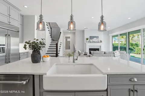 a white bath tub sitting in a bathroom