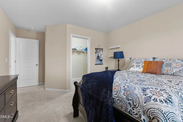 a view of a chairs and table in the roof deck
