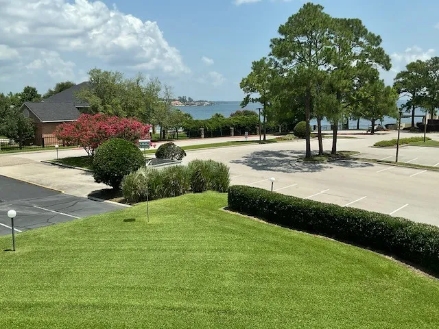 a bedroom with bed and a window