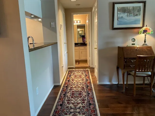 a bedroom with double bed and a large mirror