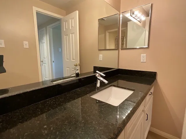 a view of a table and chairs on the deck