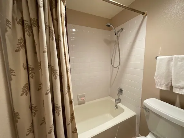 a view of a table and chairs on the deck