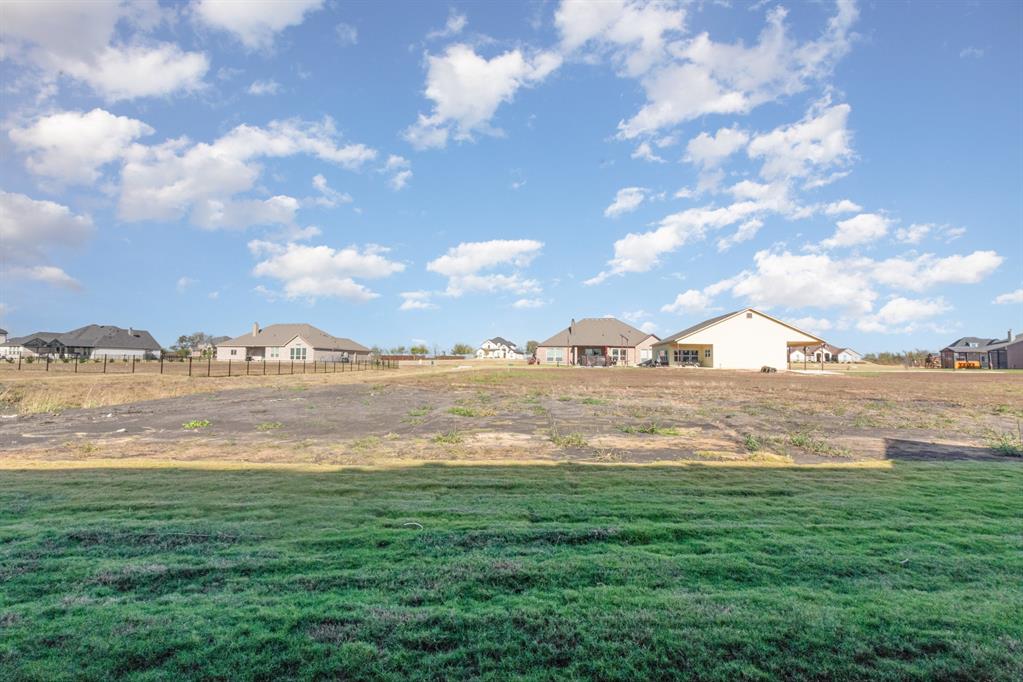 1509 Lynx Loop Forney, TX 75126 - Photo 21 of 30 a view of lake with green space