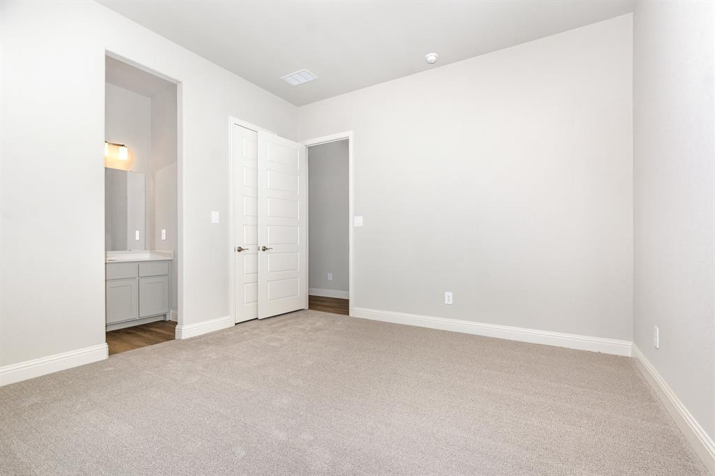 1509 Lynx Loop Forney, TX 75126 - Photo 26 of 30 an empty room with an entryway