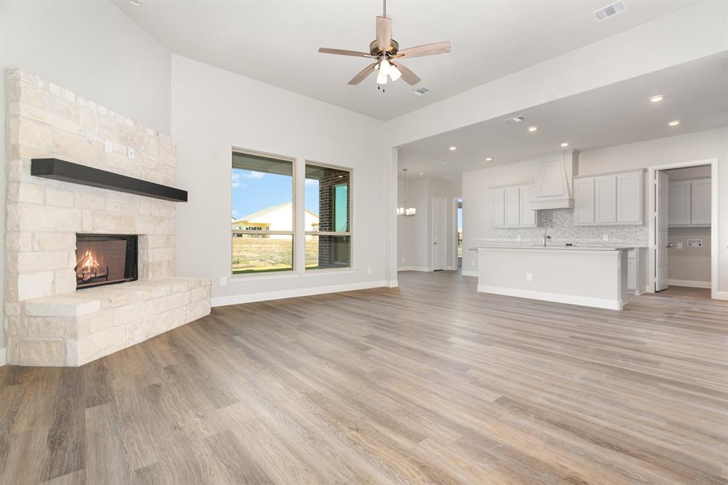 1509 Lynx Loop Forney, TX 75126 - Photo 5 of 30 a view of kitchen with sink and wooden floor