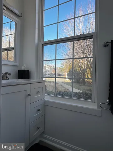 a bathroom with a sink a toilet and bathtub