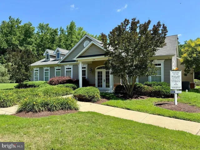 a view of a wrought iron fences in front of house