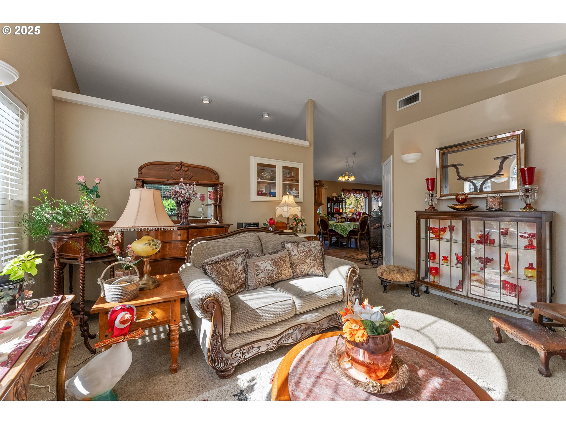 838 Marina Heights Road Brookings, OR 97415 - Photo 19 of 47 a living room filled with furniture and a wooden floor