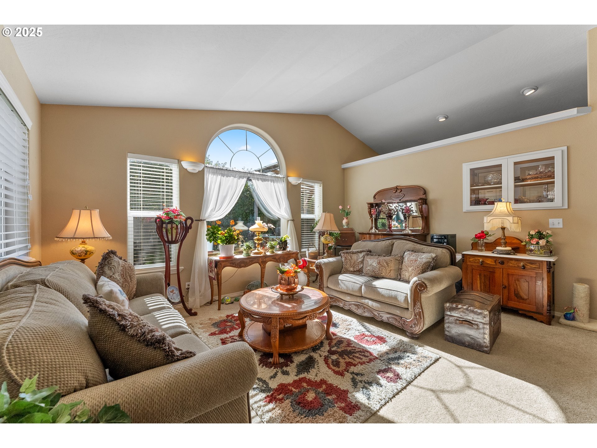 838 Marina Heights Road Brookings, OR 97415 - Photo 20 of 47 a living room with furniture and a wooden floor