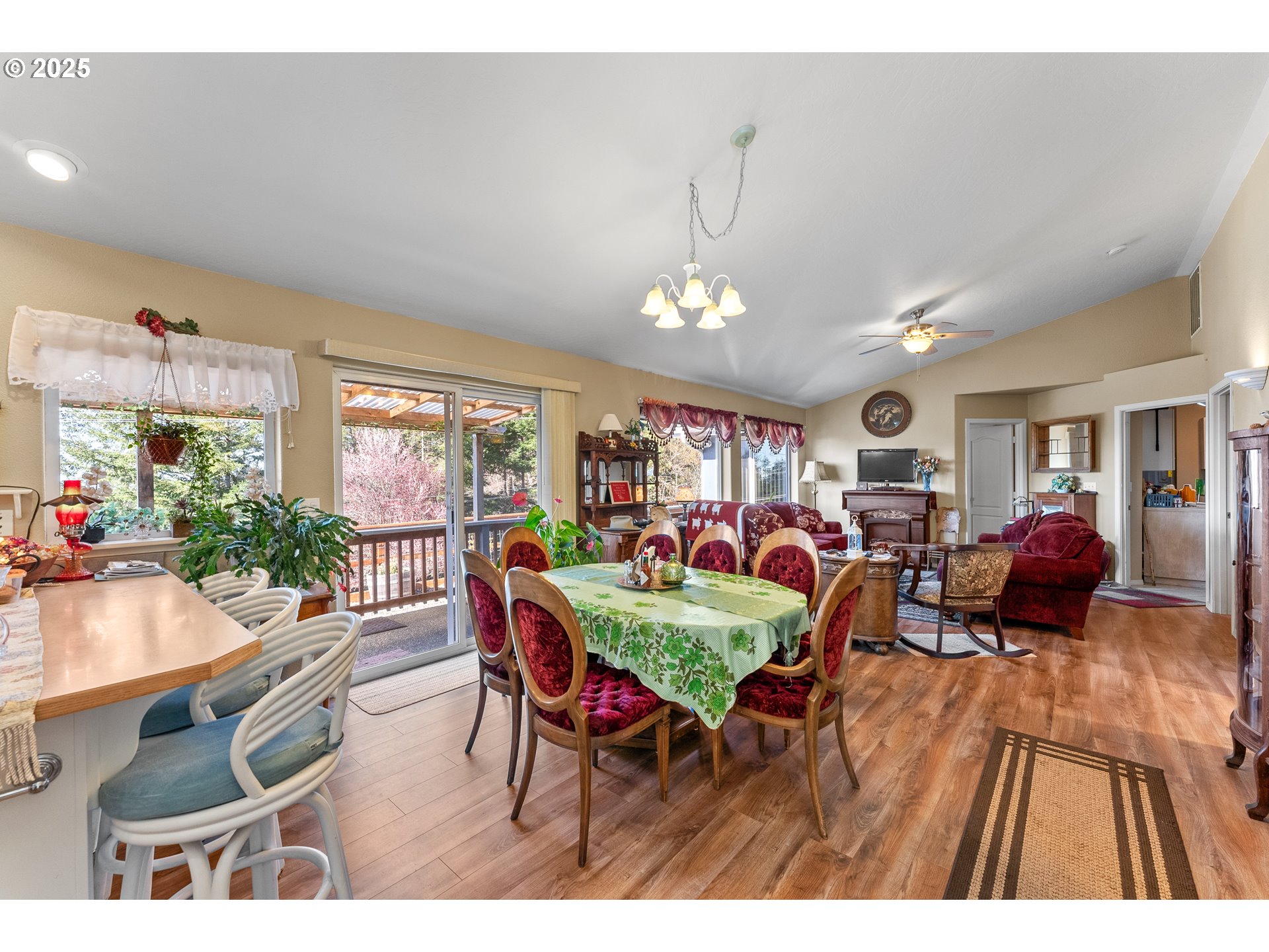838 Marina Heights Road Brookings, OR 97415 - Photo 22 of 47 a view of a dining room with furniture window and outside view