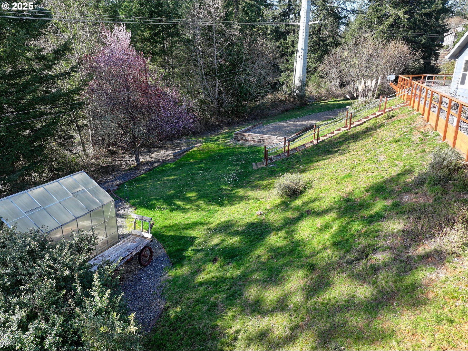 838 Marina Heights Road Brookings, OR 97415 - Photo 35 of 47 a view of a house with a yard