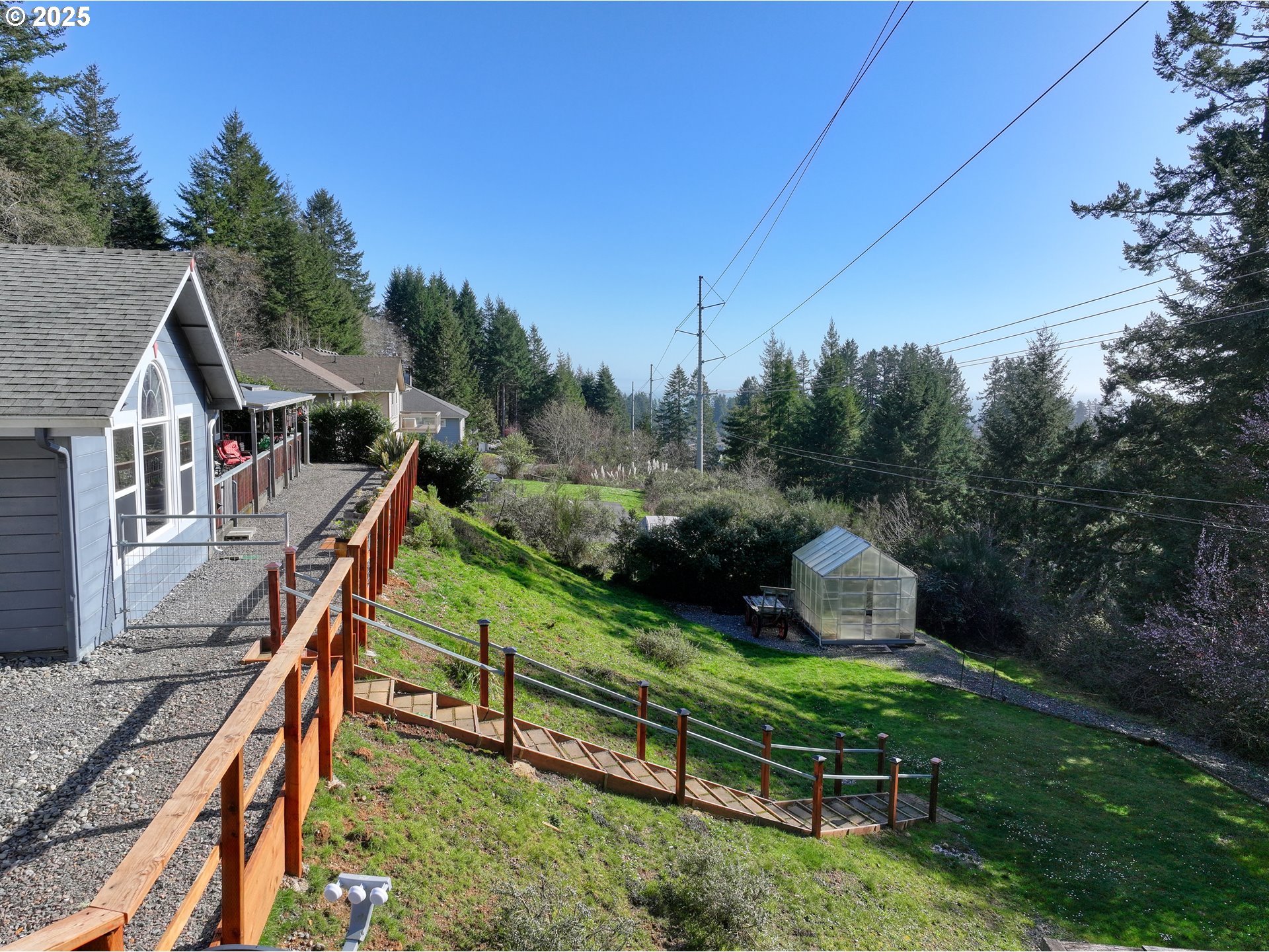 838 Marina Heights Road Brookings, OR 97415 - Photo 43 of 47 a view of a house with backyard
