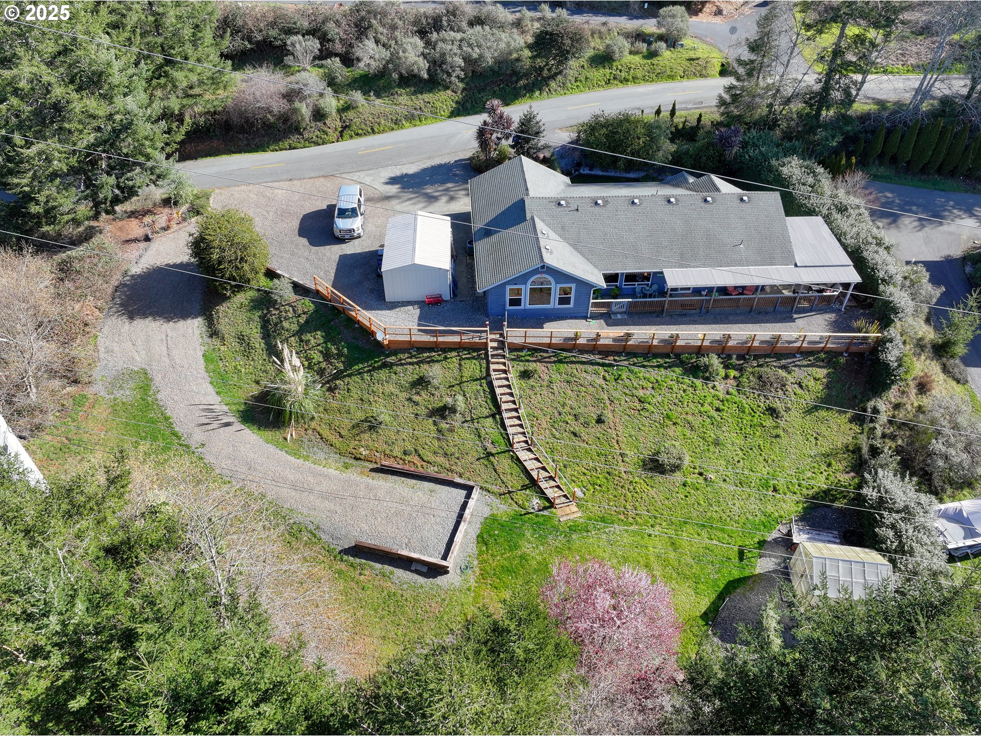 838 Marina Heights Road Brookings, OR 97415 - Photo 45 of 47 an aerial view of a house with a garden