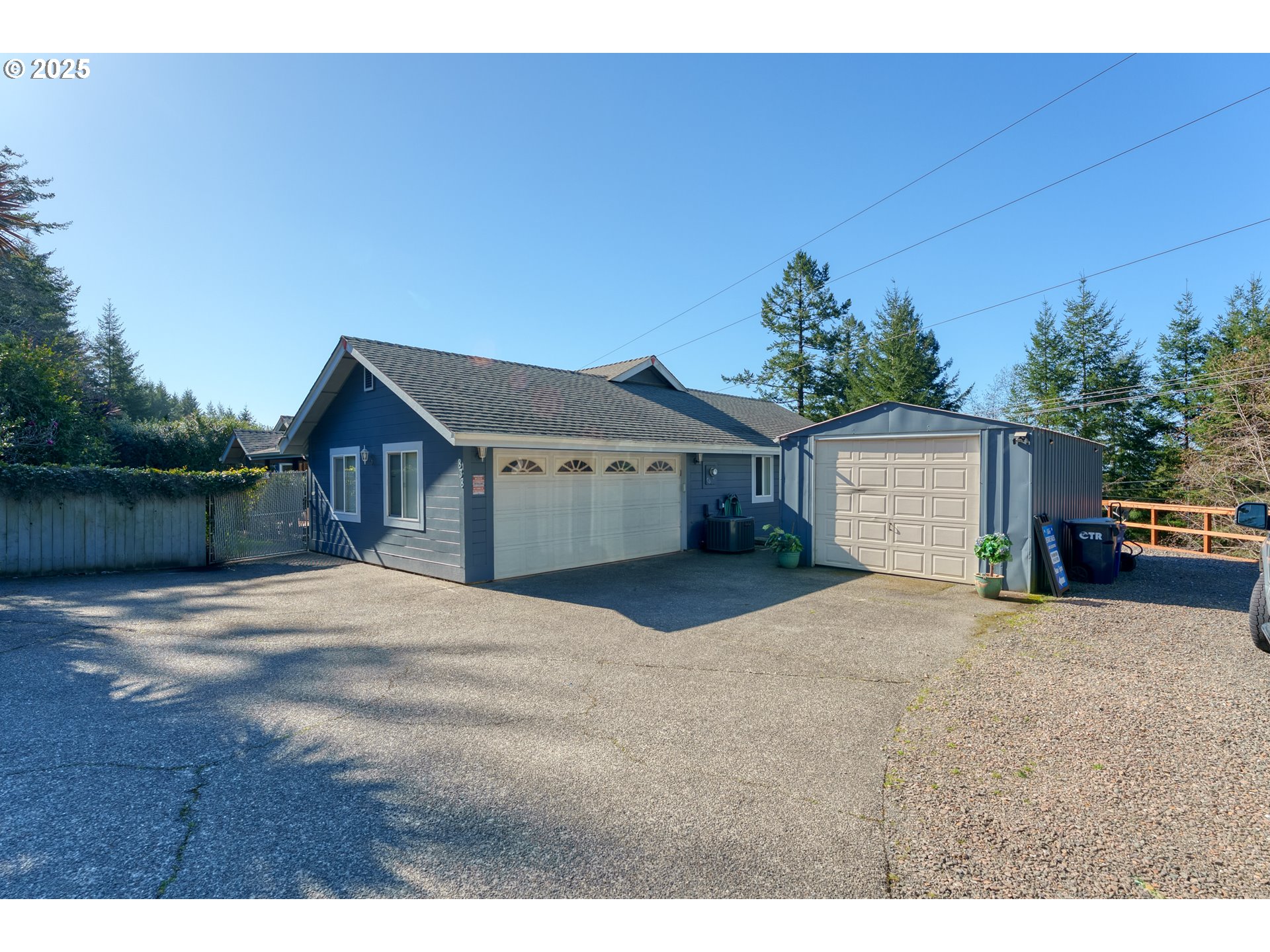 838 Marina Heights Road Brookings, OR 97415 - Photo 8 of 47 a house view with a outdoor space