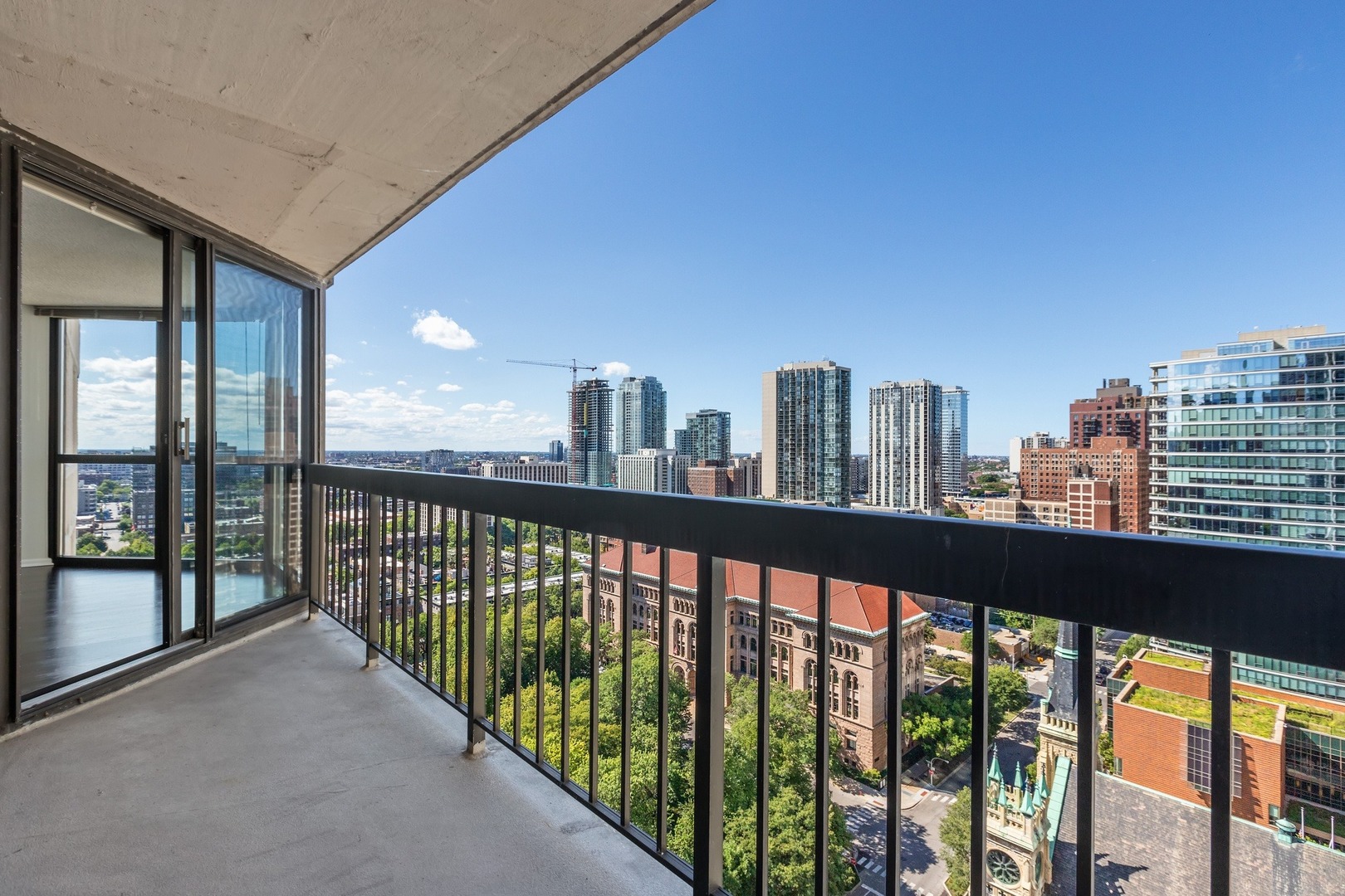 33 West Delaware Place, Unit 22H Chicago, IL 60610 - Photo 9 of 23 a view of city from a balcony