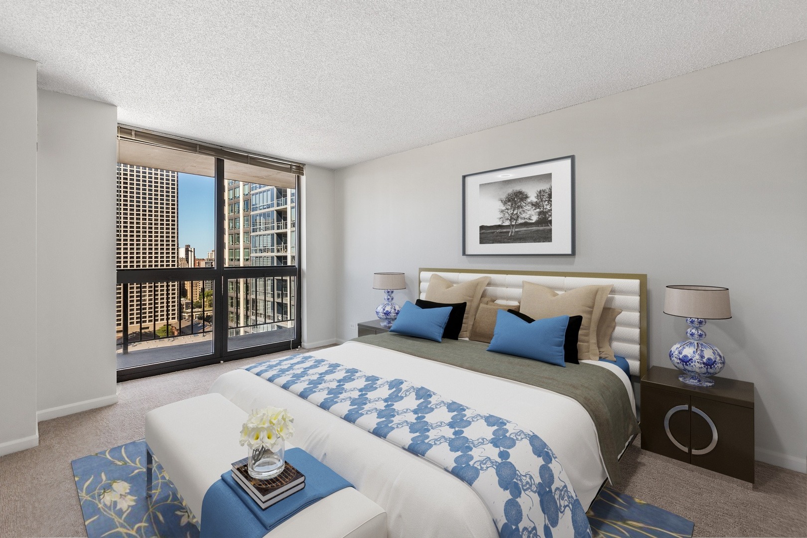 33 West Delaware Place, Unit 22H Chicago, IL 60610 - Photo 10 of 23 a bedroom with a large bed and a window