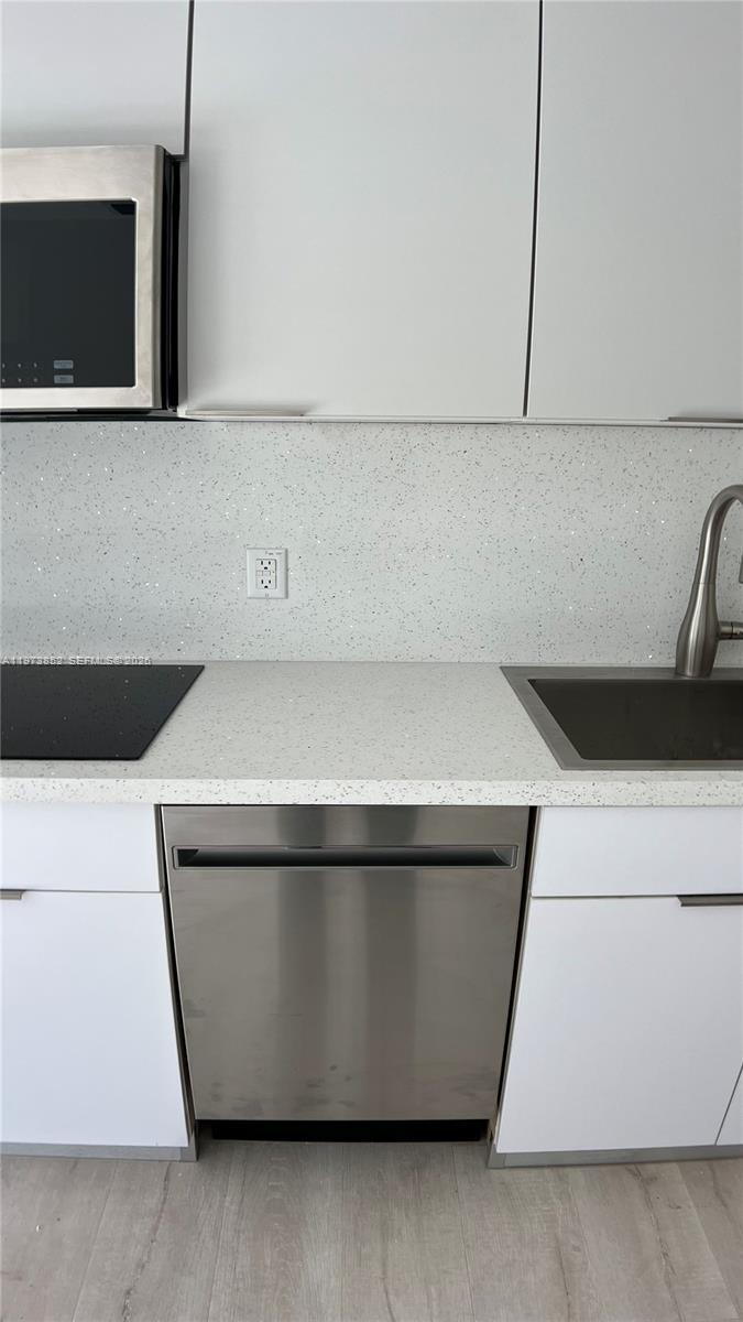 2800 Southwest 25th Street, Unit 1 Miami, FL 33133 - Photo 14 of 48 a close view of stove