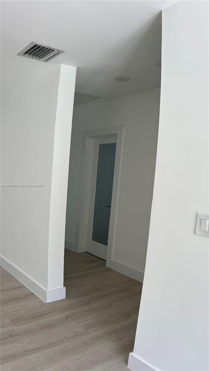 2800 Southwest 25th Street, Unit 1 Miami, FL 33133 - Photo 18 of 48 a view of an empty room