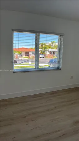 a bathroom with a shower and a toilet