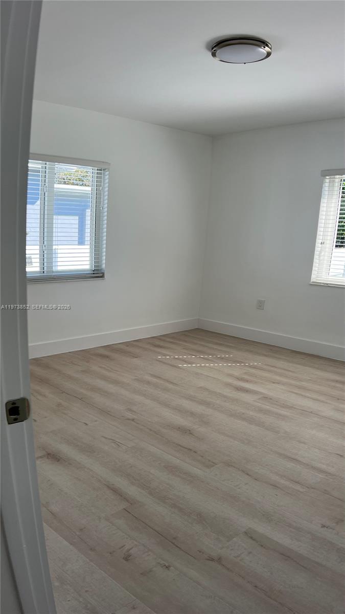 2800 Southwest 25th Street, Unit 1 Miami, FL 33133 - Photo 33 of 48 an empty room with a window
