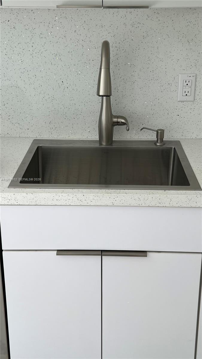 2800 Southwest 25th Street, Unit 1 Miami, FL 33133 - Photo 37 of 48 a close view of sink and tap