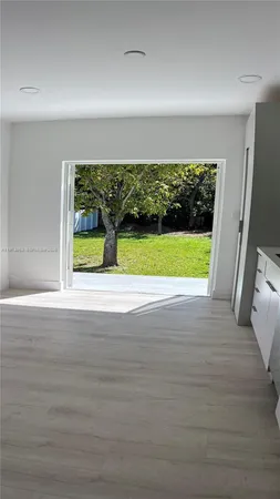 a view of a house with a small yard