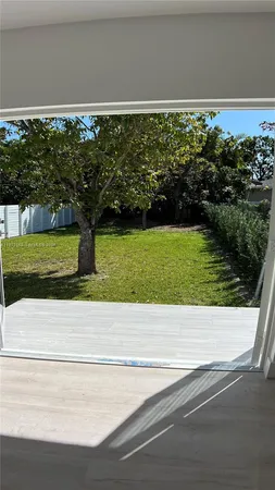 a picture of a house with a yard