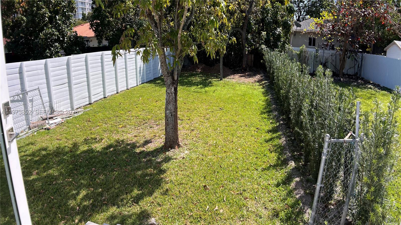 2800 Southwest 25th Street, Unit 1 Miami, FL 33133 - Photo 44 of 48 a view of a garden