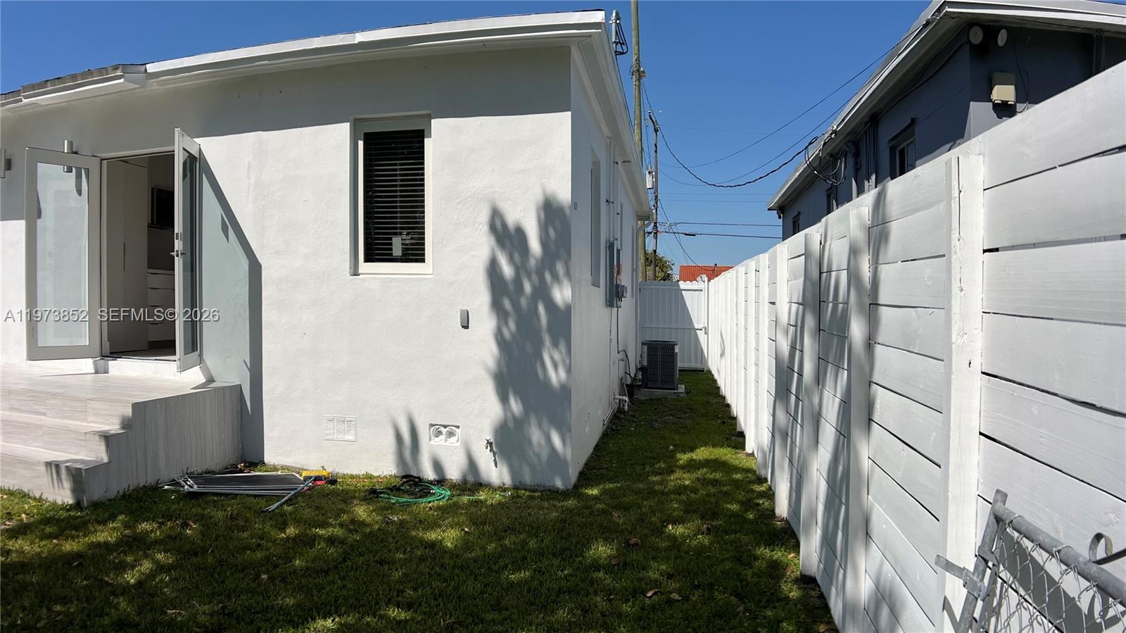 2800 Southwest 25th Street, Unit 1 Miami, FL 33133 - Photo 47 of 48 a view of a house with a small yard