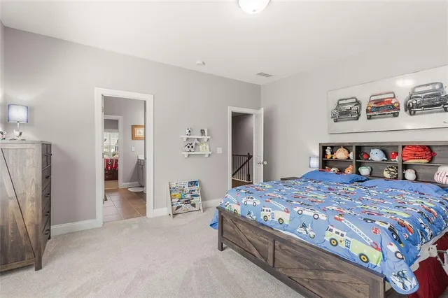 a view of entryway with wooden floor and stairs