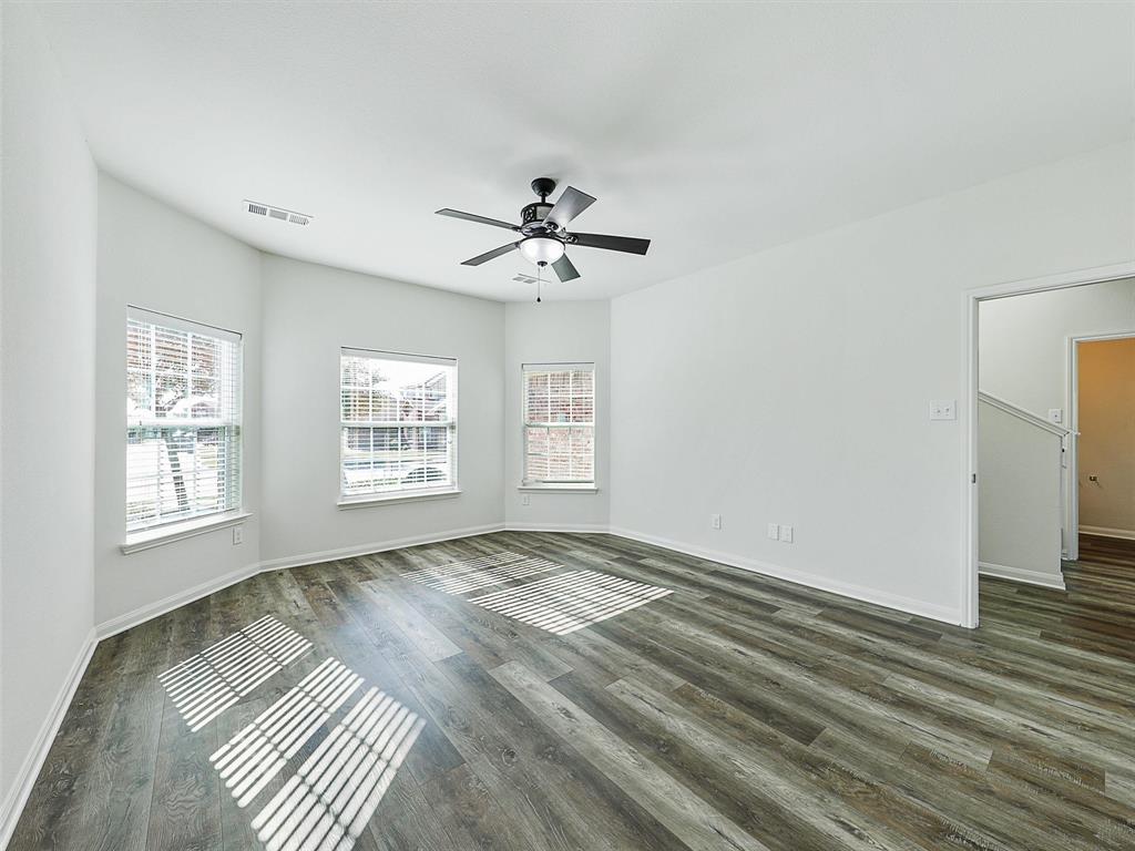 1402 Englemann Drive Princeton, TX 75407 - Photo 12 of 33 Downstairs Primary Bedroom with room for your private sitting area or large enough for an infant space
