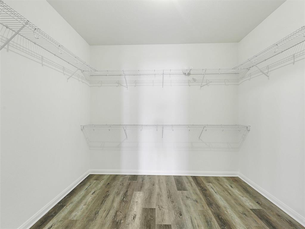 1402 Englemann Drive Princeton, TX 75407 - Photo 14 of 33 Primary downstairs bedroom walkin closet