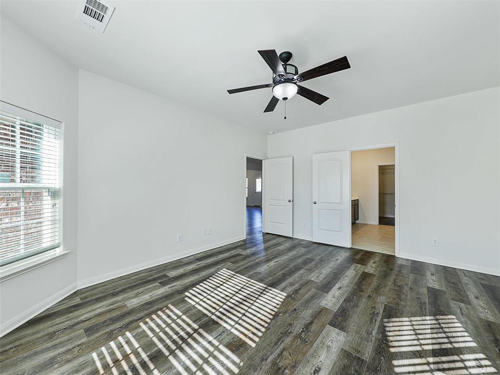 1402 Englemann Drive Princeton, TX 75407 - Photo 15 of 33 The ensuite bath is nice and open with the most desired amenities.