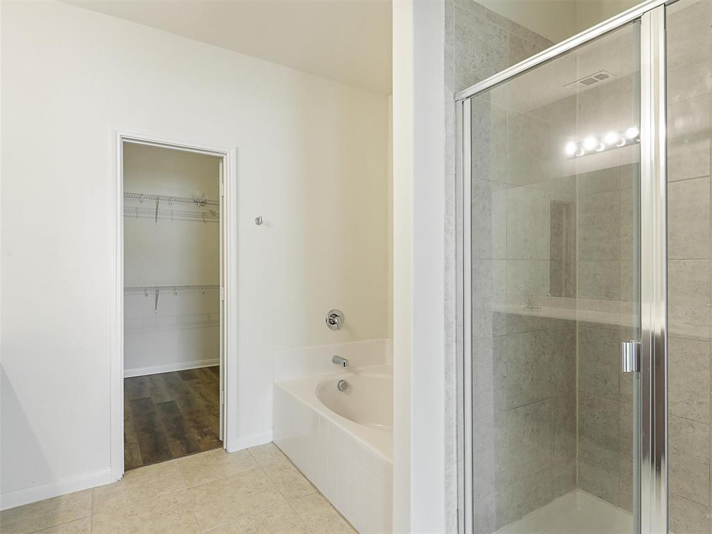 1402 Englemann Drive Princeton, TX 75407 - Photo 16 of 33 Ensuite bath with garden tub and separate shower