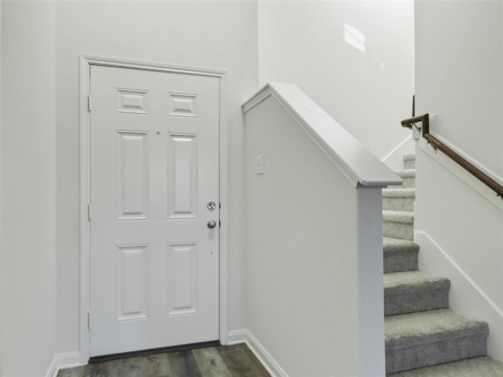 1402 Englemann Drive Princeton, TX 75407 - Photo 18 of 33 Entry stairway to upstairs bedrooms